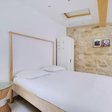 Between Montmartre And Moulin Rouge Paris