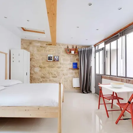 Between Montmartre And Moulin Rouge Paris