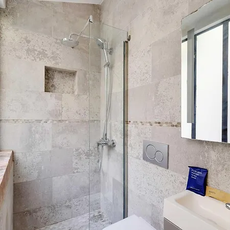 Between Montmartre And Moulin Rouge Paris